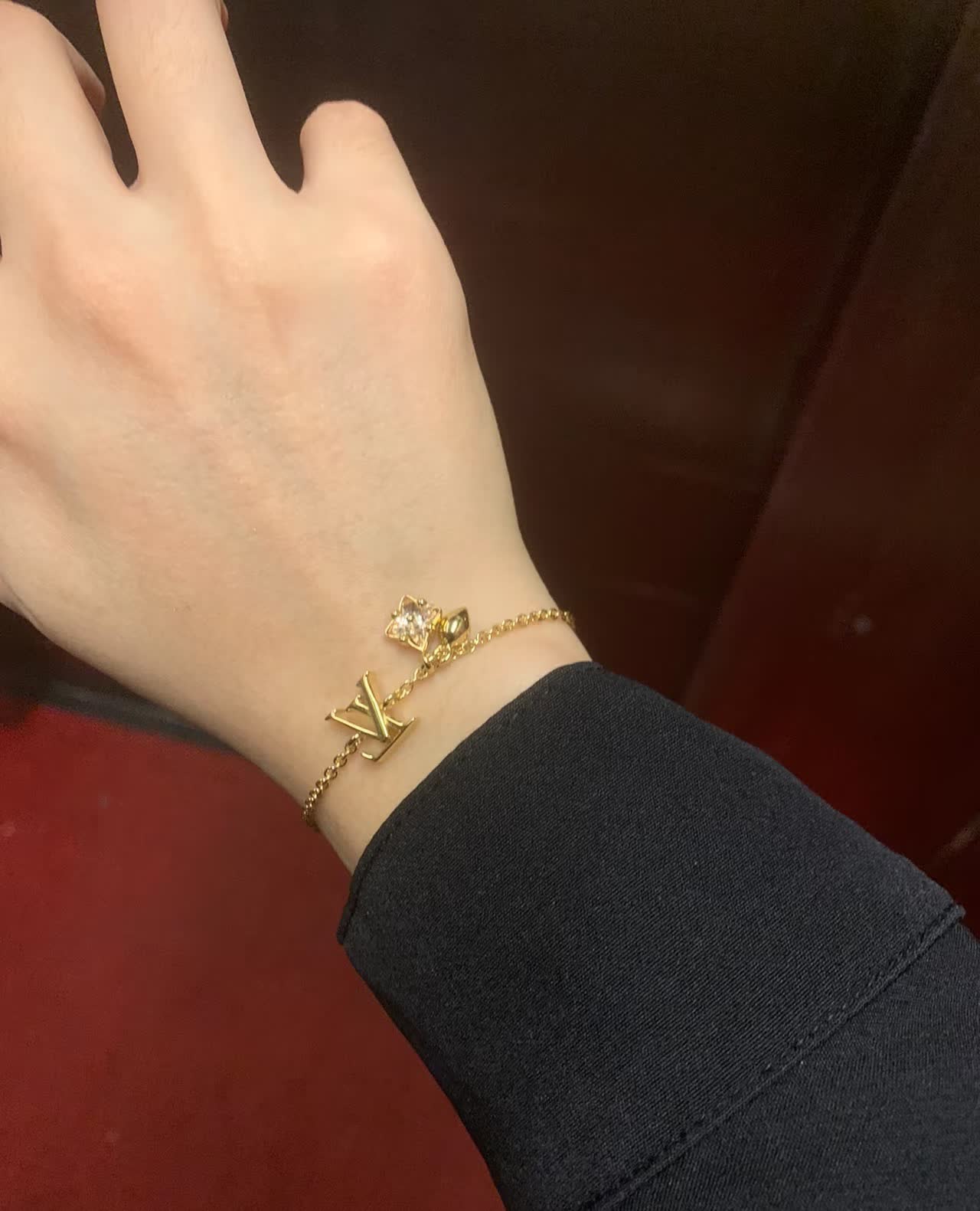 Louis Vuitton Gold Tone Bracelet with Charms